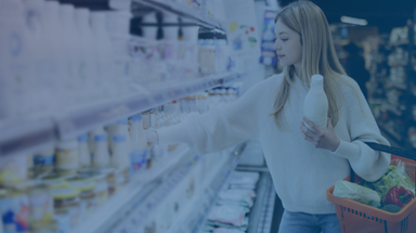 consumer in dairy products aisle