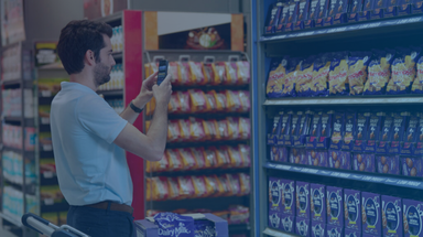 Merchandiser points Trax app at retail shelf