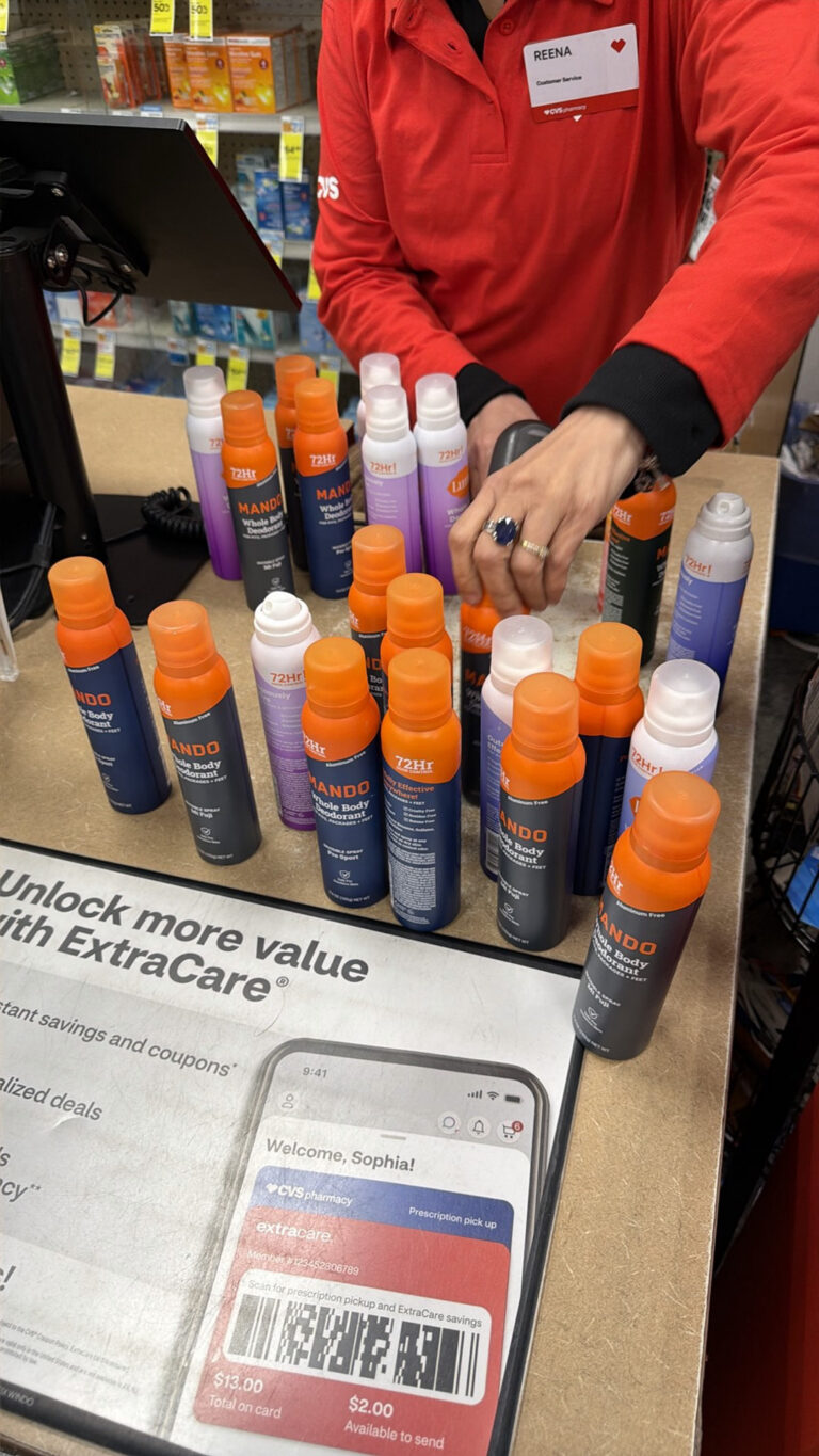 Survey field representative completing product purchase and removal activities in store.